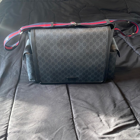 Black Gucci diaper bag with blue and red strap. - Picture 1 of 9